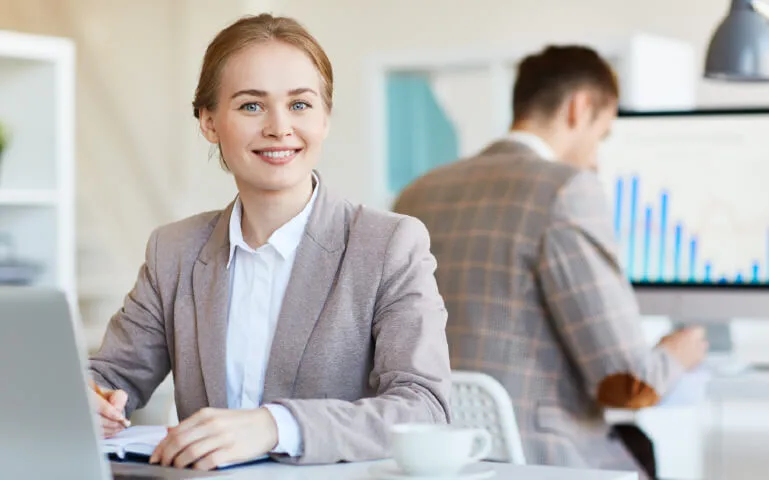 A corporate employee working on finding buyer intent data tools